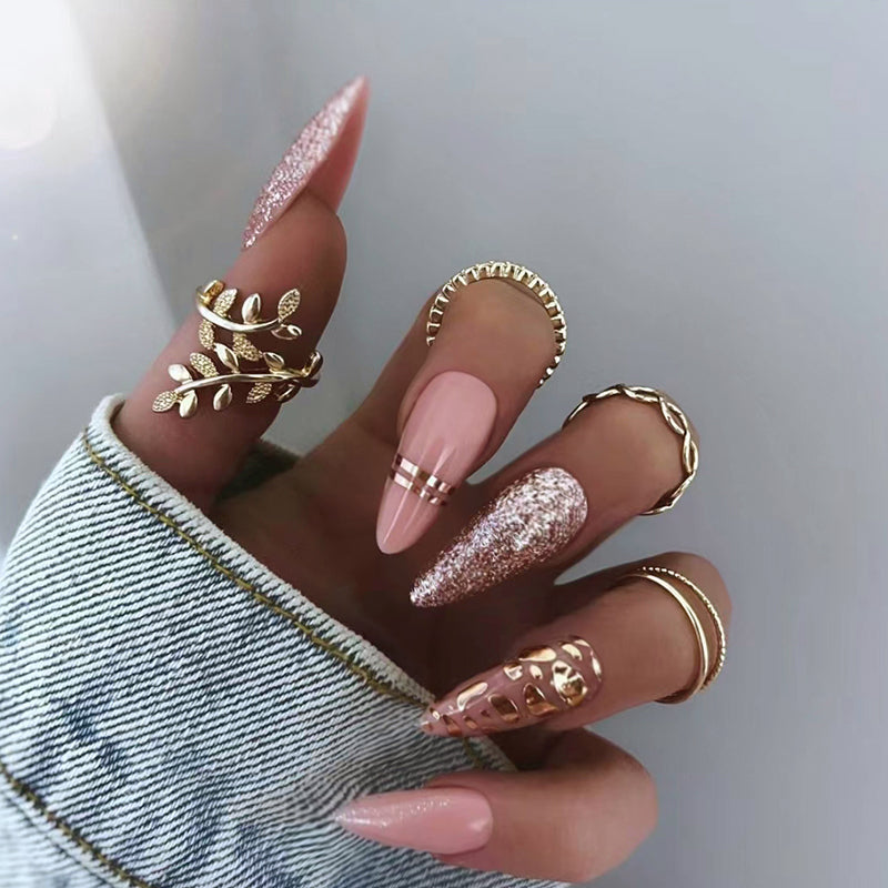 Pink nails gold rings